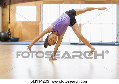 Chinese girl practicing gymnastics View Large Photo Image Stock Image - Chinese girl practicing gymnastics. Fotosearch