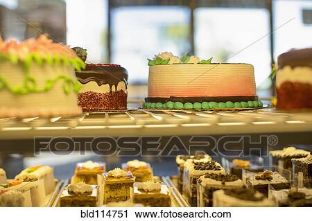 Close up of cakes in pastry case View Large Photo Image Stock Image - Close up of cakes in pastry case. Fotosearch