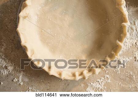 Stock Image - Close up of empty pie shell. Fotosearch
