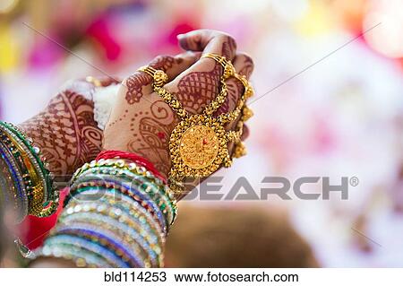 Close up of hands with intricate henna design View Large Photo Image Stock Image - Close up of hands with intricate henna design. Fotosearch