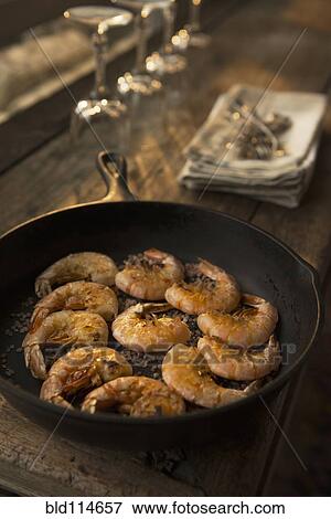 Frying shrimp in pan View Large Photo Image Stock Photo - Frying shrimp in pan. Fotosearch