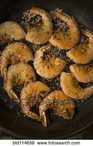 Frying shrimp in pan View Large Photo Image Stock Photo - Frying shrimp in pan. Fotosearch