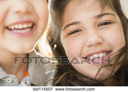 Stock Photo - Hispanic children smiling. Fotosearch