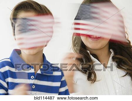 Hispanic children waving American flags View Large Photo Image Stock Photo - Hispanic children waving American flags. Fotosearch