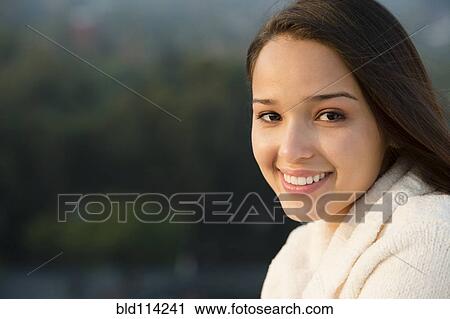 Hispanic woman smiling View Large Photo Image Stock Image - Hispanic woman smiling. Fotosearch