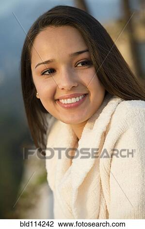 Hispanic woman smiling View Large Photo Image Stock Image - Hispanic woman smiling. Fotosearch