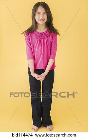 Picture - Mixed race girl smiling. Fotosearch
