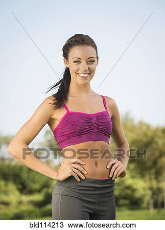 Mixed race woman smiling outdoors View Large Photo Image Stock Image - Mixed race woman smiling outdoors. Fotosearch