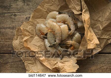 Raw shrimp in butcher paper View Large Photo Image Stock Photo - Raw shrimp in butcher paper. Fotosearch