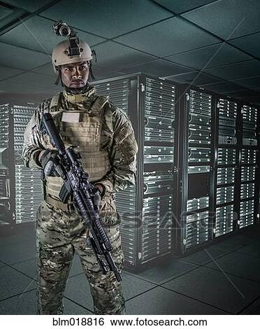 Stock Photograph - African American soldier in server room. Fotosearch
