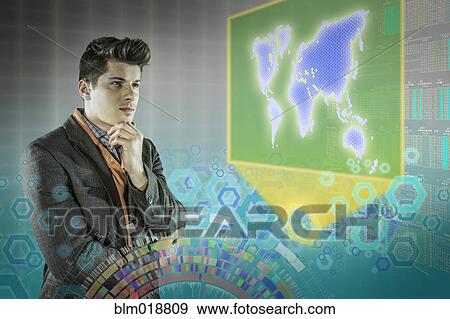 Stock Photo - Caucasian businessman examining illuminated holograms. Fotosearch