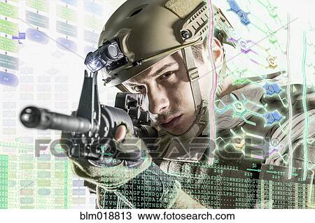 Caucasian soldier pointing gun at illuminated holograms View Large Photo Image Stock Image - Caucasian soldier pointing gun at illuminated holograms. Fotosearch