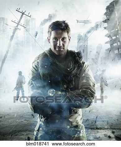 Caucasian soldier standing in combat zone View Large Photo Image Stock Image - Caucasian soldier standing in combat zone. Fotosearch