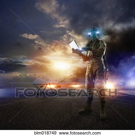 Caucasian soldier using laptop in combat zone View Large Photo Image Stock Photo - Caucasian soldier using laptop in combat zone. Fotosearch