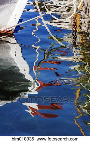 Reflections of boats in harbor View Large Photo Image Stock Photography - Reflections of boats in harbor. Fotosearch