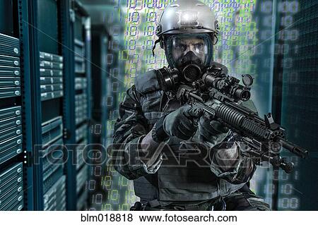Stock Photo - Soldier holding gun in server room. Fotosearch