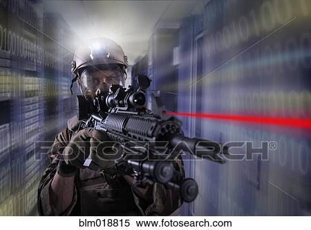 Stock Photography - Soldier holding gun in server room. Fotosearch