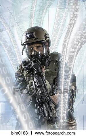 Soldier pointing gun at illuminated holograms View Large Photo Image Stock Image - Soldier pointing gun at illuminated holograms. Fotosearch