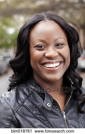 Woman smiling View Large Photo Image Stock Image - Woman smiling. Fotosearch