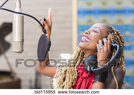 African American singer listening to track in studio View Large Photo Image Stock Photography - African American singer listening to track in studio. Fotosearch