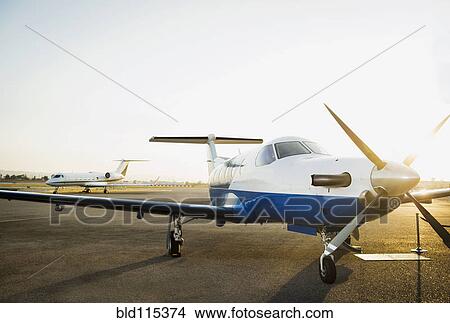 Airplane grounded on runway View Large Photo Image Picture - Airplane grounded on runway. Fotosearch