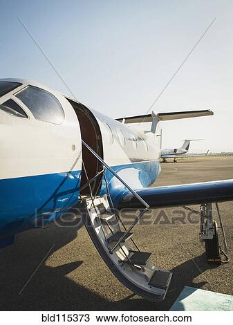 Airplane grounded on runway View Large Photo Image Stock Image - Airplane grounded on runway. Fotosearch