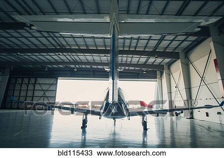 Airplane in hangar View Large Photo Image Stock Image - Airplane in hangar. Fotosearch