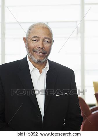 Black businessman smiling View Large Photo Image Stock Image - Black businessman smiling. Fotosearch