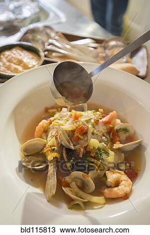 Bowl of seafood stew View Large Photo Image Stock Image - Bowl of seafood stew. Fotosearch