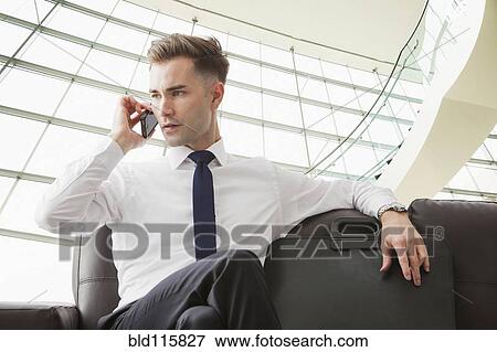Caucasian businessman talking on cell phone View Large Photo Image Stock Photo - Caucasian businessman talking on cell phone. Fotosearch