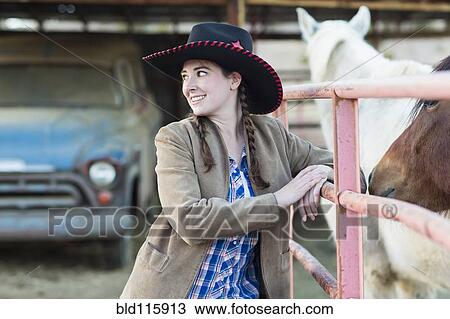 Caucasian girl smiling on farm View Large Photo Image Stock Image - Caucasian girl smiling on farm. Fotosearch