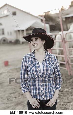Stock Photograph - Caucasian girl smiling on farm. Fotosearch