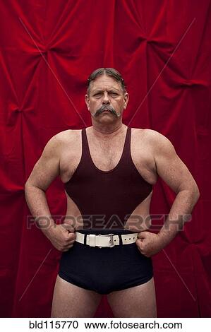 Caucasian weight lifter flexing his muscles View Large Photo Image Stock Image - Caucasian weight lifter flexing his muscles. Fotosearch