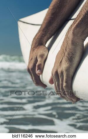 Stock Photograph - Close up of Caucasian man's hands. Fotosearch