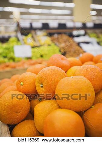 Stock Photo - Close up of fruit for sale in grocery store. Fotosearch