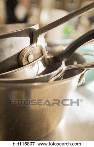 Close up of stacked pots and pans View Large Photo Image Stock Photo - Close up of stacked pots and pans. Fotosearch