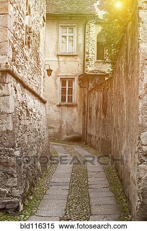 Cobblestones in village alleyway View Large Photo Image Stock Photography - Cobblestones in village alleyway. Fotosearch