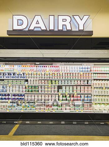 Stock Image - Dairy section of grocery store. Fotosearch