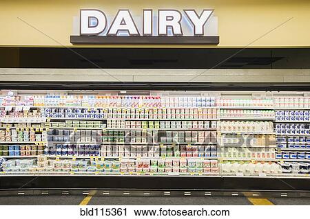 Stock Image - Dairy section of grocery store. Fotosearch