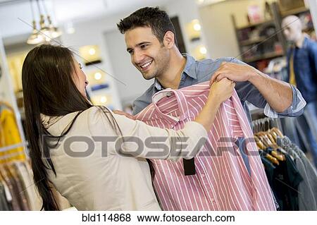 Hispanic couple shopping together View Large Photo Image Stock Photo - Hispanic couple shopping together. Fotosearch