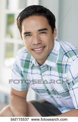 Hispanic man smiling View Large Photo Image Stock Photo - Hispanic man smiling. Fotosearch