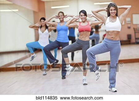 Hispanic women taking exercise class in gym View Large Photo Image Stock Photography - Hispanic women taking exercise class in gym. Fotosearch