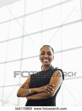 Stock Photo - Indian businesswoman smiling. Fotosearch