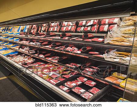 Stock Image - Meat section of grocery store. Fotosearch