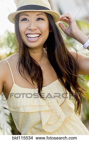 Mixed race woman smiling View Large Photo Image Picture - Mixed race woman smiling. Fotosearch