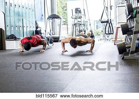 Pacific Islander man working out in gym View Large Photo Image Stock Photo - Pacific Islander man working out in gym. Fotosearch