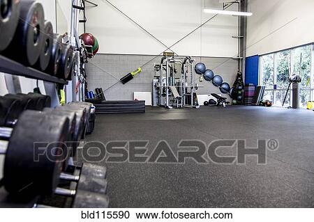 Rack of weights in gym View Large Photo Image Stock Image - Rack of weights in gym. Fotosearch