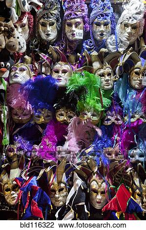 Stock Image - Rows of ornate masks. Fotosearch