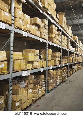 Shelves of boxes in textile factory View Large Photo Image Stock Photograph - Shelves of boxes in textile factory. Fotosearch