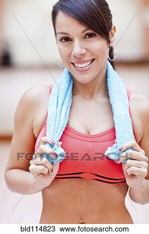 Woman smiling in gym View Large Photo Image Stock Image - Woman smiling in gym. Fotosearch